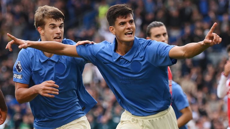 Chema Andres celebrates after heading Brighton into a 3-0 lead